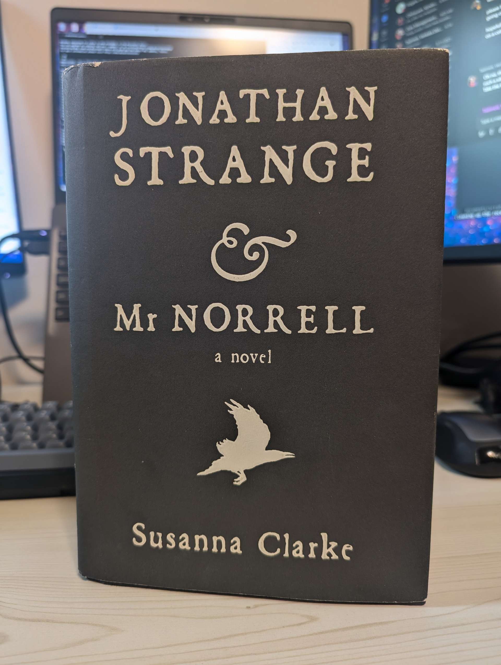 Photo of book "Jonathan Strange and Mr. Norrell" by Susanna Clark. First Edition, First printing, US Edition, Black Cover.